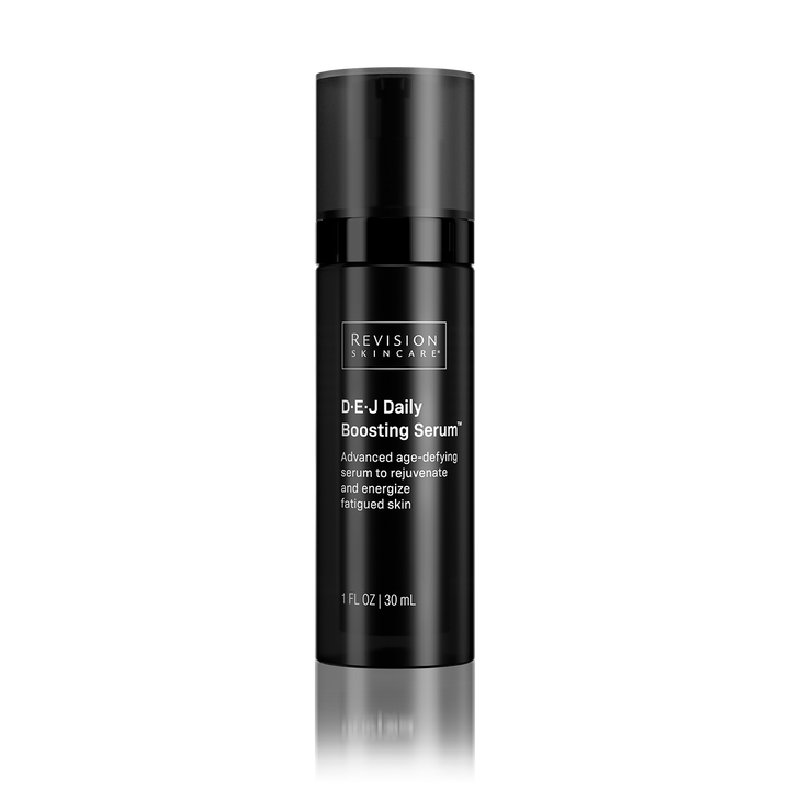 Black skincare serum bottle with 'Revision Skincare' branding on a white background